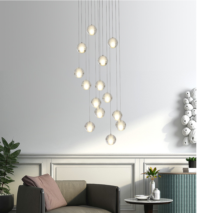 Nordic style staircase living room can use transparent glass ball chandelier.